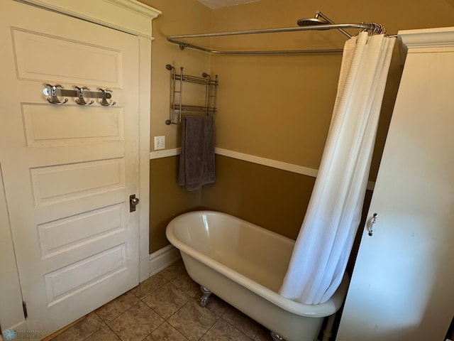 619 University Dr S, Fargo, ND 58103 - full bathroom featuring a soaking tub, tile patterned floors, and a shower with shower curtain