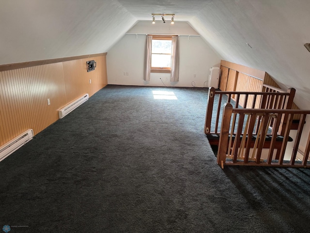 619 University Dr S, Fargo, ND 58103 - additional living space with baseboard heating, lofted ceiling, and carpet floors