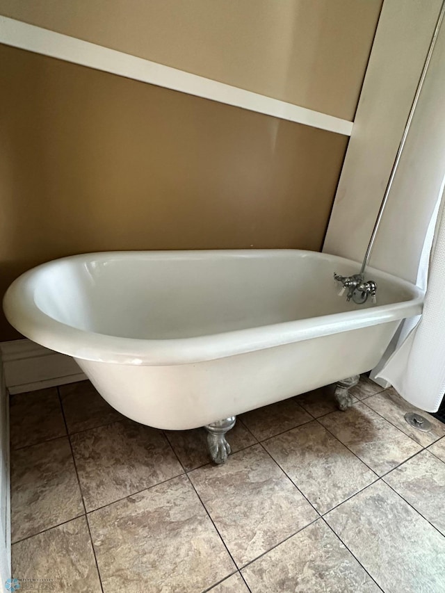 619 University Dr S, Fargo, ND 58103 - full bath with tile patterned floors and a freestanding tub