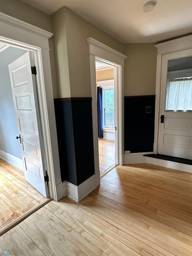 619 University Dr S, Fargo, ND 58103 - hallway featuring light wood-type flooring and baseboards
