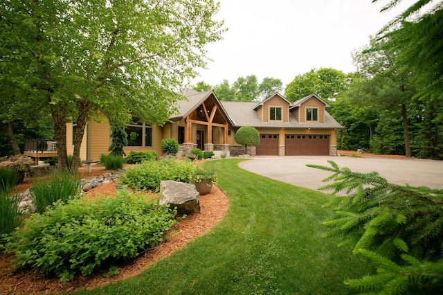 8271 Barton Ave NW, Buffalo, MN 55313 - view of front of property featuring stone siding, driveway, and a front lawn