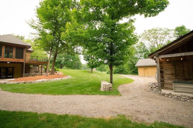 8271 Barton Ave NW, Buffalo, MN 55313 - view of green lawn featuring a deck