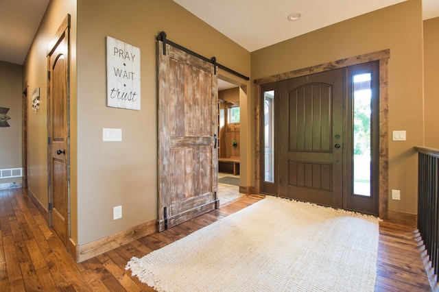 8271 Barton Ave NW, Buffalo, MN 55313 - entrance foyer featuring wood finished floors and healthy amount of natural light