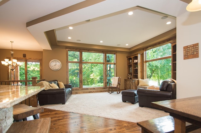 8271 Barton Ave NW, Buffalo, MN 55313 - living room with a chandelier, healthy amount of natural light, hardwood / wood-style floors, and recessed lighting