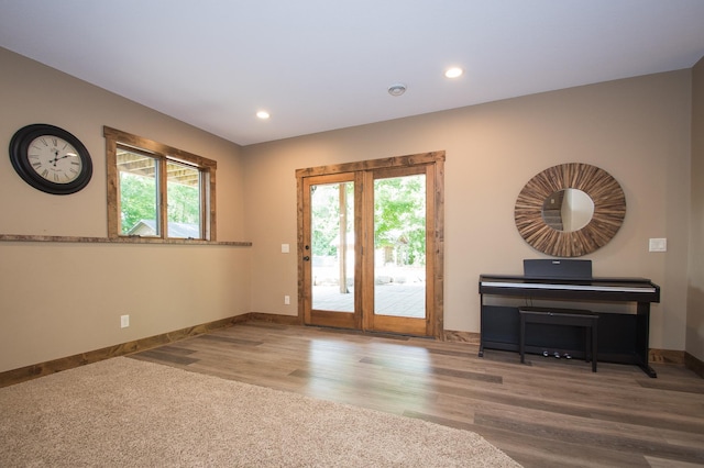 8271 Barton Ave NW, Buffalo, MN 55313 - doorway featuring healthy amount of natural light, wood finished floors, and recessed lighting