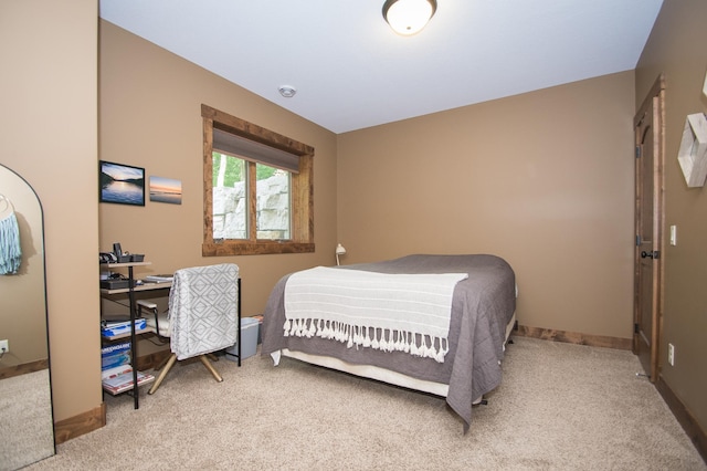 8271 Barton Ave NW, Buffalo, MN 55313 - bedroom with light carpet and baseboards