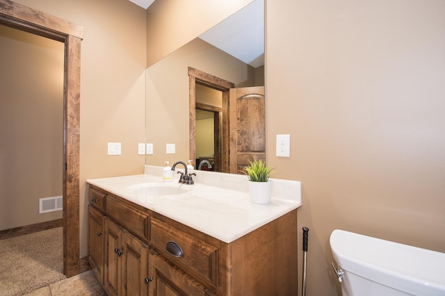 8271 Barton Ave NW, Buffalo, MN 55313 - bathroom with vanity and toilet