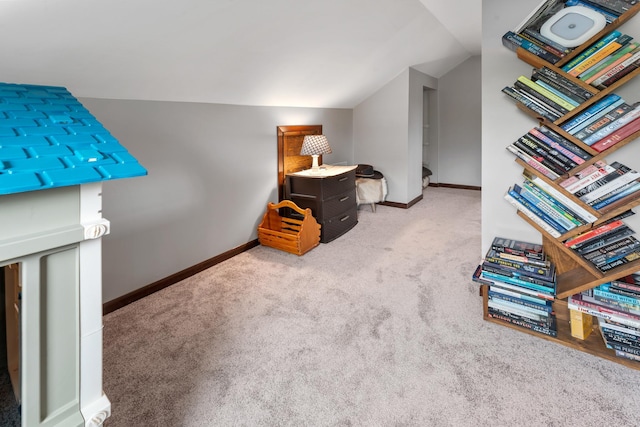 632 Quince St, Duluth, MN 55811 - carpeted bedroom with lofted ceiling and baseboards