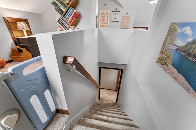632 Quince St, Duluth, MN 55811 - staircase with carpet floors and a water view