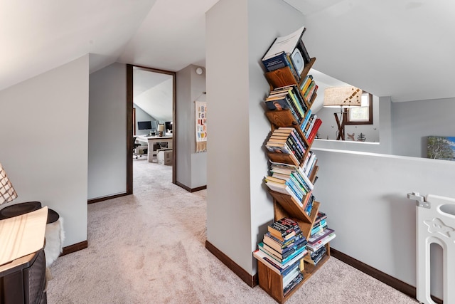 632 Quince St, Duluth, MN 55811 - corridor with vaulted ceiling, carpet, and an office area