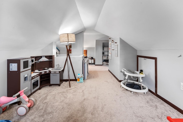 632 Quince St, Duluth, MN 55811 - recreation room featuring vaulted ceiling and light carpet