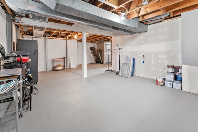 632 Quince St, Duluth, MN 55811 - unfinished below grade area with refrigerator