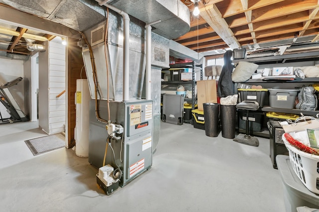 632 Quince St, Duluth, MN 55811 - below grade area featuring water heater and heating unit