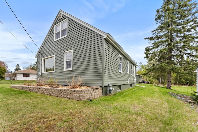 632 Quince St, Duluth, MN 55811 - view of property exterior with a yard