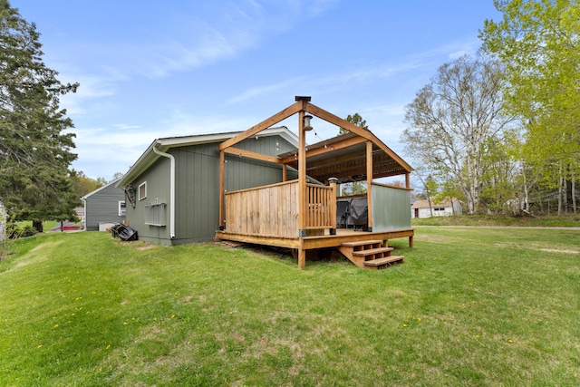 632 Quince St, Duluth, MN 55811 - back of property with a deck and a yard