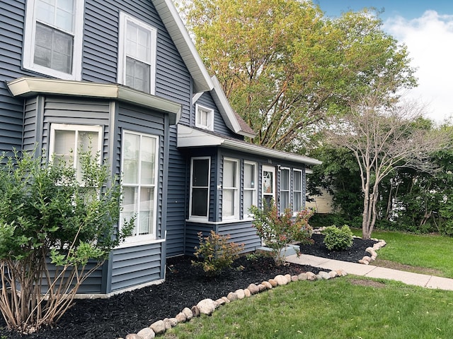 330 10th Ave, Granite Falls, MN 56241 - view of home's exterior with a yard