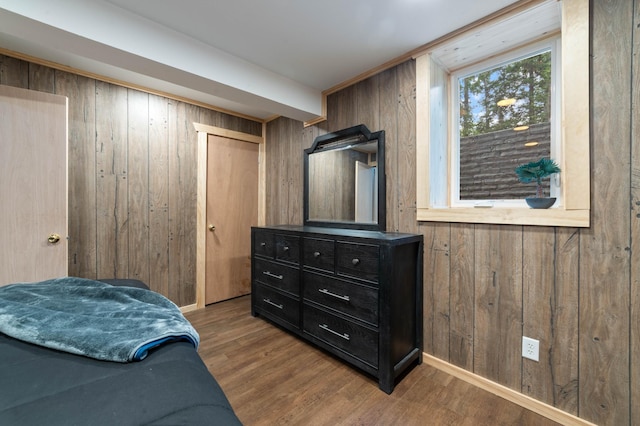 185 Olson Rd, Thomson Twp, MN 55733 - bedroom with wooden walls and wood finished floors