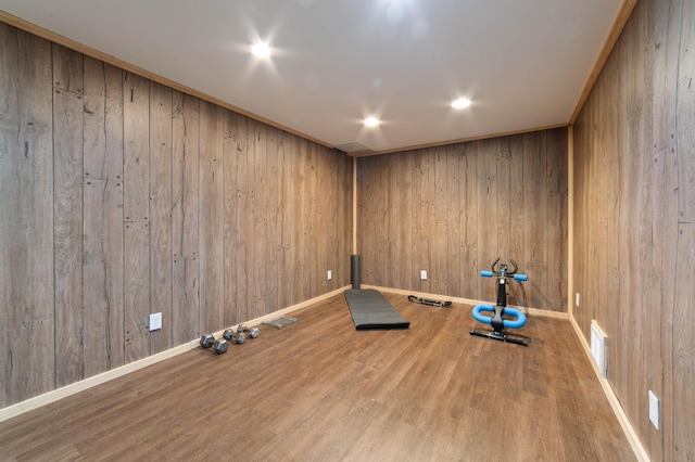 185 Olson Rd, Thomson Twp, MN 55733 - workout room featuring wood finished floors and wooden walls