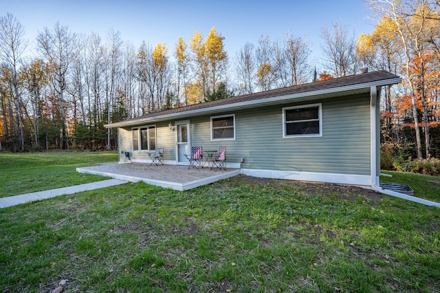 185 Olson Rd, Thomson Twp, MN 55733 - back of house featuring a lawn