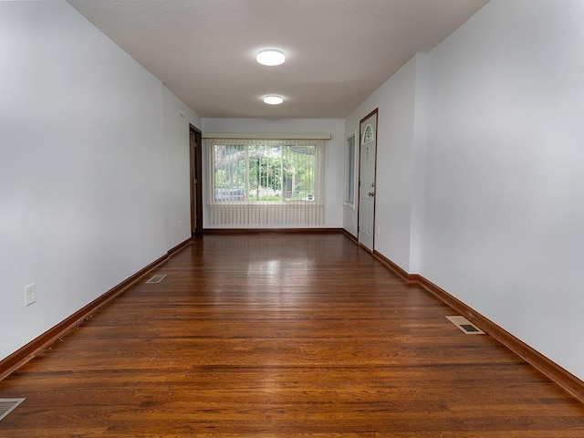 4021 Colfax Ave N, Minneapolis, MN 55412 - unfurnished room featuring wood finished floors and baseboards