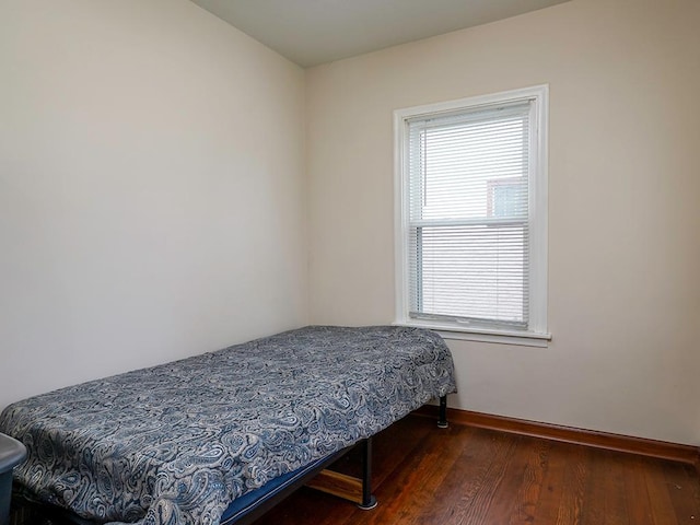 4021 Colfax Ave N, Minneapolis, MN 55412 - bedroom featuring wood finished floors and multiple windows