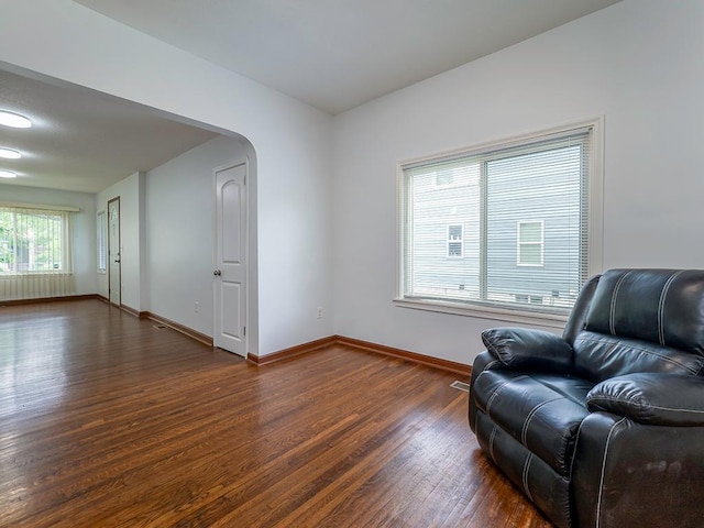 4021 Colfax Ave N, Minneapolis, MN 55412 - living area featuring wood finished floors and arched walkways