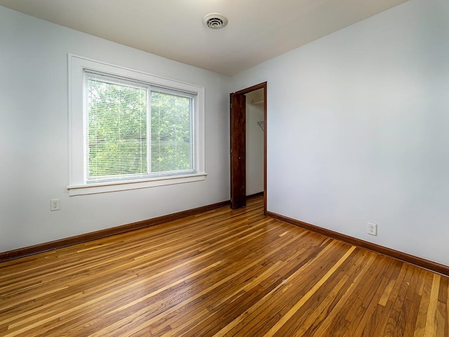 4021 Colfax Ave N, Minneapolis, MN 55412 - empty room with wood-type flooring and baseboards