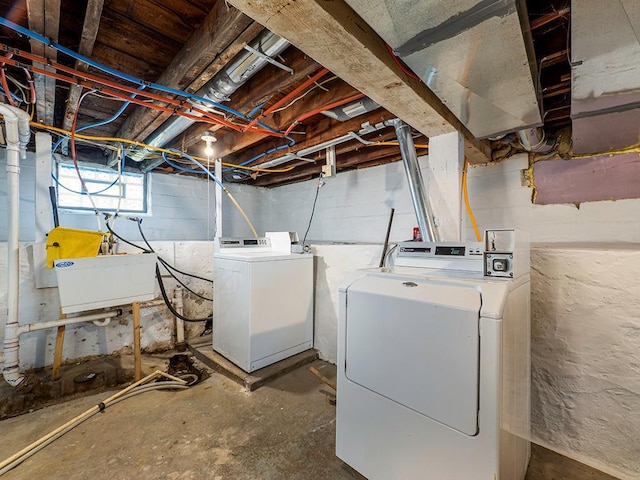 4021 Colfax Ave N, Minneapolis, MN 55412 - basement with washer and clothes dryer and a sink
