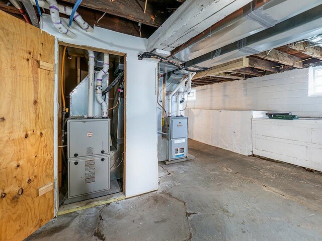4021 Colfax Ave N, Minneapolis, MN 55412 - basement with heating unit and concrete block wall