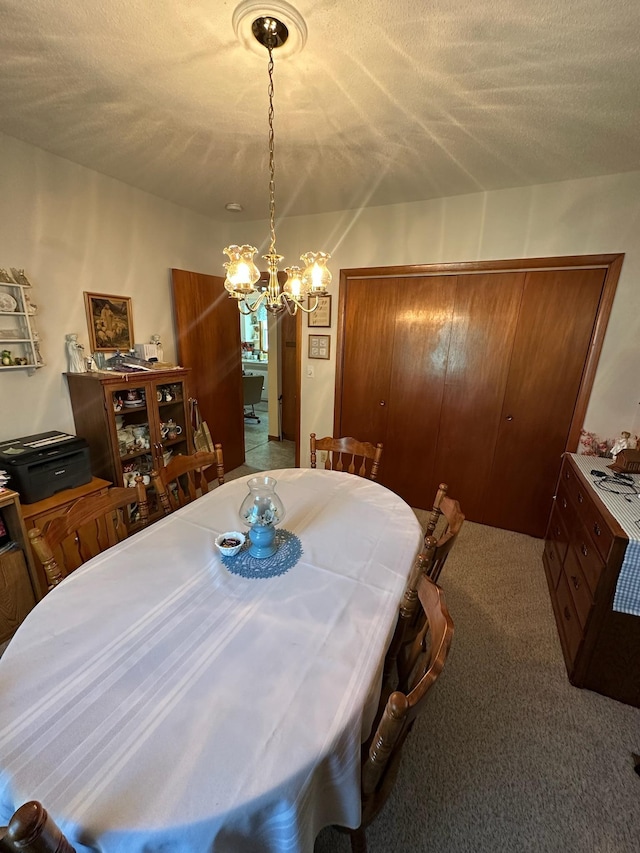 925 Willow St W, Detroit Lakes, MN 56501 - dining space with a chandelier and carpet flooring