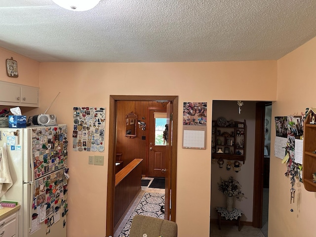 925 Willow St W, Detroit Lakes, MN 56501 - hall featuring a textured ceiling