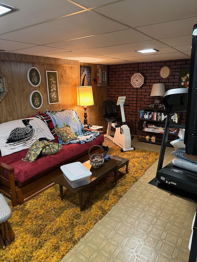 925 Willow St W, Detroit Lakes, MN 56501 - living area featuring wood walls and a paneled ceiling