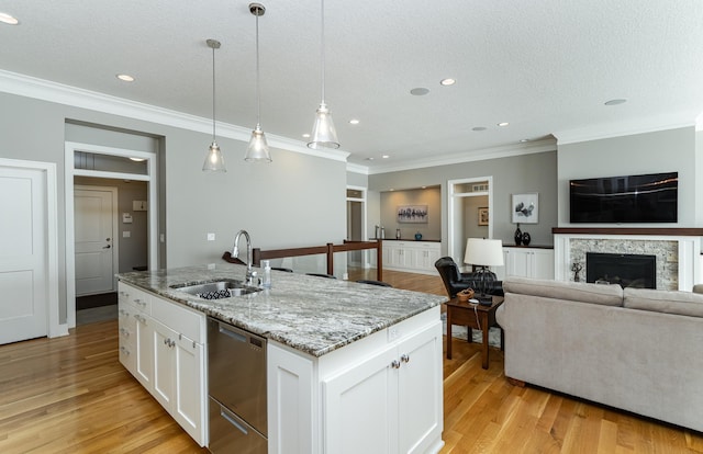 1062 Fox Hill Ln SW, Rochester, MN 55902 - kitchen featuring dishwasher, ornamental molding, open floor plan, light wood-type flooring, and white cabinetry