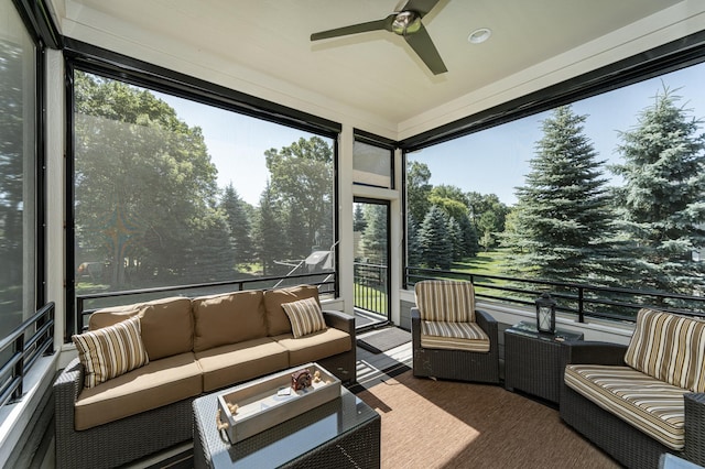 1062 Fox Hill Ln SW, Rochester, MN 55902 - sunroom featuring a ceiling fan and an outdoor hangout area