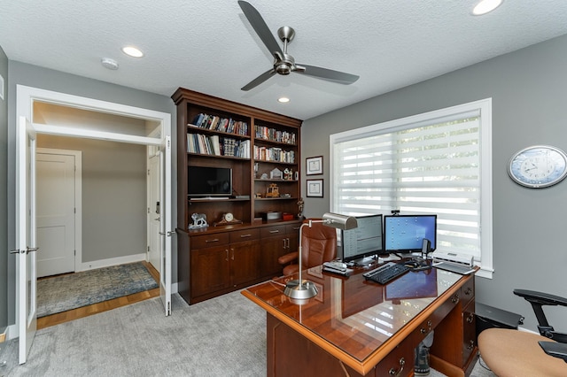 1062 Fox Hill Ln SW, Rochester, MN 55902 - home office with a ceiling fan, light carpet, a textured ceiling, and recessed lighting