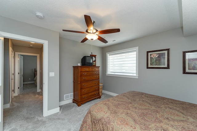 1062 Fox Hill Ln SW, Rochester, MN 55902 - bedroom featuring light carpet and ceiling fan