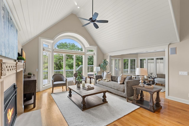 11193 Bluestem Ln, Eden Prairie, MN 55347 - living area featuring high vaulted ceiling, light wood-type flooring, and ceiling fan