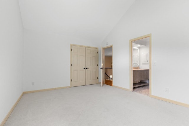 11193 Bluestem Ln, Eden Prairie, MN 55347 - unfurnished bedroom with light colored carpet, vaulted ceiling, a closet, and ensuite bathroom