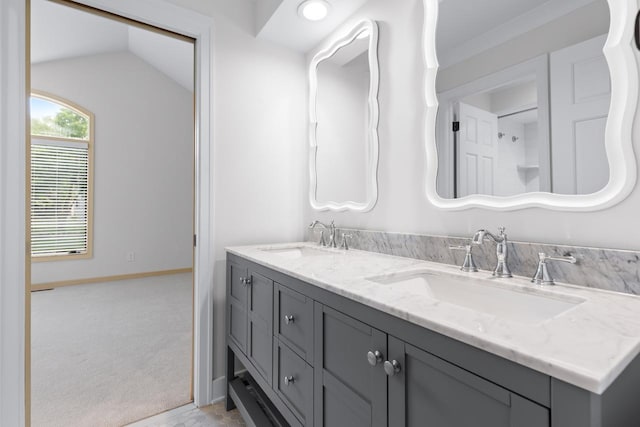 11193 Bluestem Ln, Eden Prairie, MN 55347 - bathroom with double vanity and vaulted ceiling