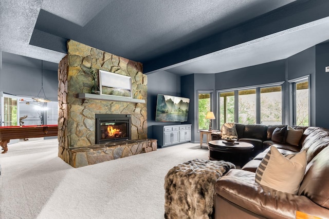 11193 Bluestem Ln, Eden Prairie, MN 55347 - living area with carpet floors, a fireplace, a textured ceiling, and billiards table