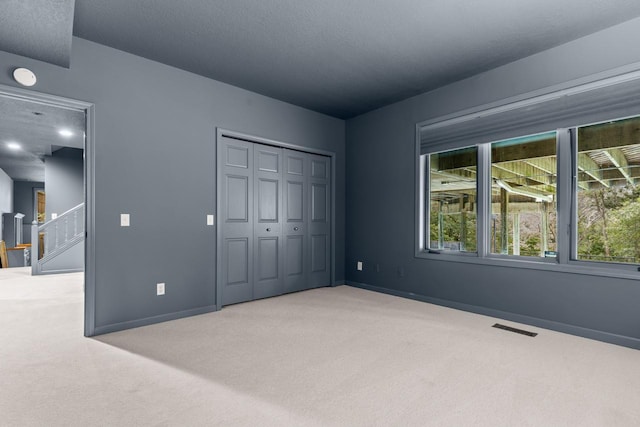 11193 Bluestem Ln, Eden Prairie, MN 55347 - unfurnished bedroom with carpet and a closet