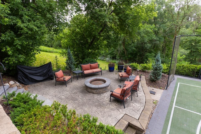 11193 Bluestem Ln, Eden Prairie, MN 55347 - view of patio / terrace featuring a fire pit