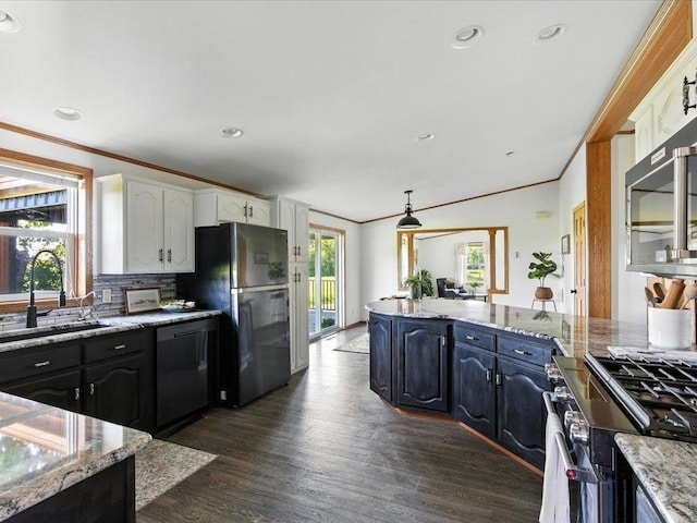 33498 175th St NE, Morrill Twp, MN 56329 - kitchen with freestanding refrigerator, dishwasher, white cabinets, gas range oven, and tasteful backsplash