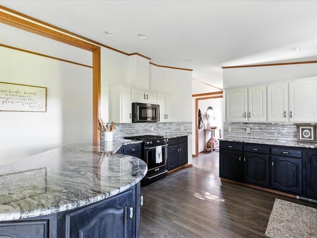 33498 175th St NE, Morrill Twp, MN 56329 - kitchen featuring black microwave, gas range, white cabinets, light stone counters, and crown molding