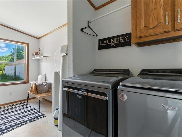 33498 175th St NE, Morrill Twp, MN 56329 - laundry area featuring cabinet space, washing machine and dryer, ornamental molding, and light flooring