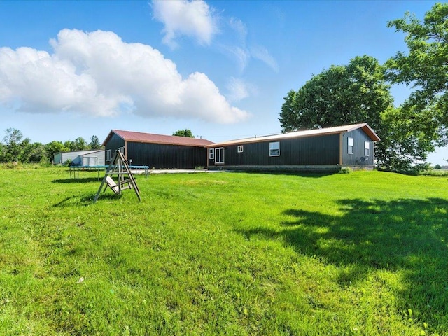 33498 175th St NE, Morrill Twp, MN 56329 - rear view of house with a lawn