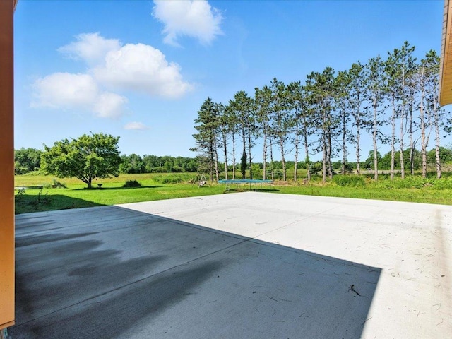 33498 175th St NE, Morrill Twp, MN 56329 - view of patio / terrace featuring a trampoline