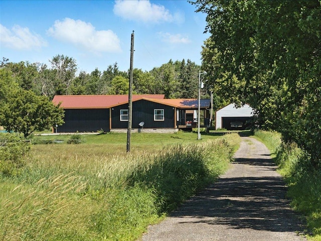 33498 175th St NE, Morrill Twp, MN 56329 - ranch-style house with driveway and a metal roof