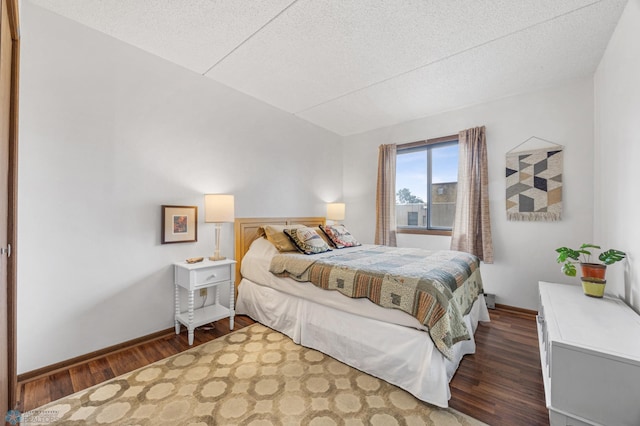 1110 3rd Ave N Unit 201E, Fargo, ND 58102 - bedroom with wood finished floors and a textured ceiling