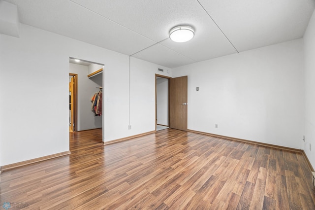 1110 3rd Ave N Unit 201E, Fargo, ND 58102 - spare room with wood finished floors and baseboards